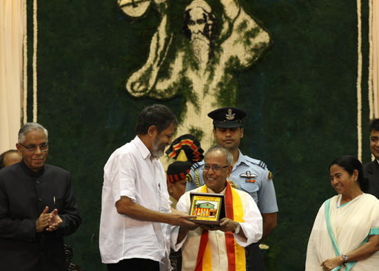 The President of India, Shri Pranab Mukherjee, being felicitated by various personalities at a Civic Reception at Netaji Indoor Stadium at Kolkata in West Bengal on September 14, 2012. The Governor of West Bengal, Shri M.K. Narayanan and the Chief Ministe