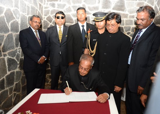The President of India, Shri Pranab Mukherjee signing the Visitors' Book at the memorial site at the Apravasi Ghat Ghat in Port Louis, Mauritius on March 12, 2013.