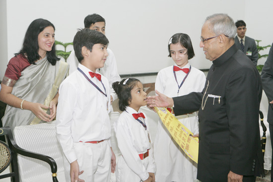 The President of India, Shri Pranab Mukherjee meeting with the childrens from various schools on the occasion of Children's Day at Rashtrapati Bhavan Auditorium on November 14, 2012.