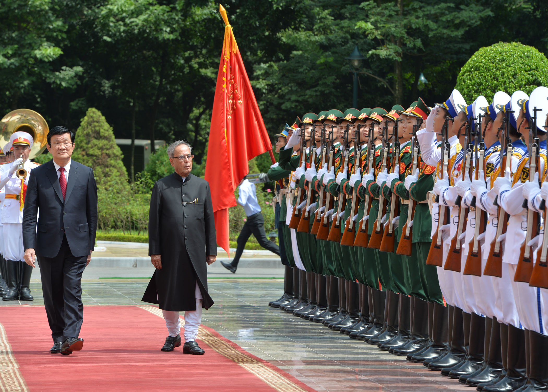 The President of India, Shri Pranab Mukherjee inspecting the Guard of Honour presented to his at the Ceremonial Reception at Presidential Palace in Hanoi, Vietnam on September 15, 2014. Also seen is the President of the Socialist Republic of Vietnam, H.E. 