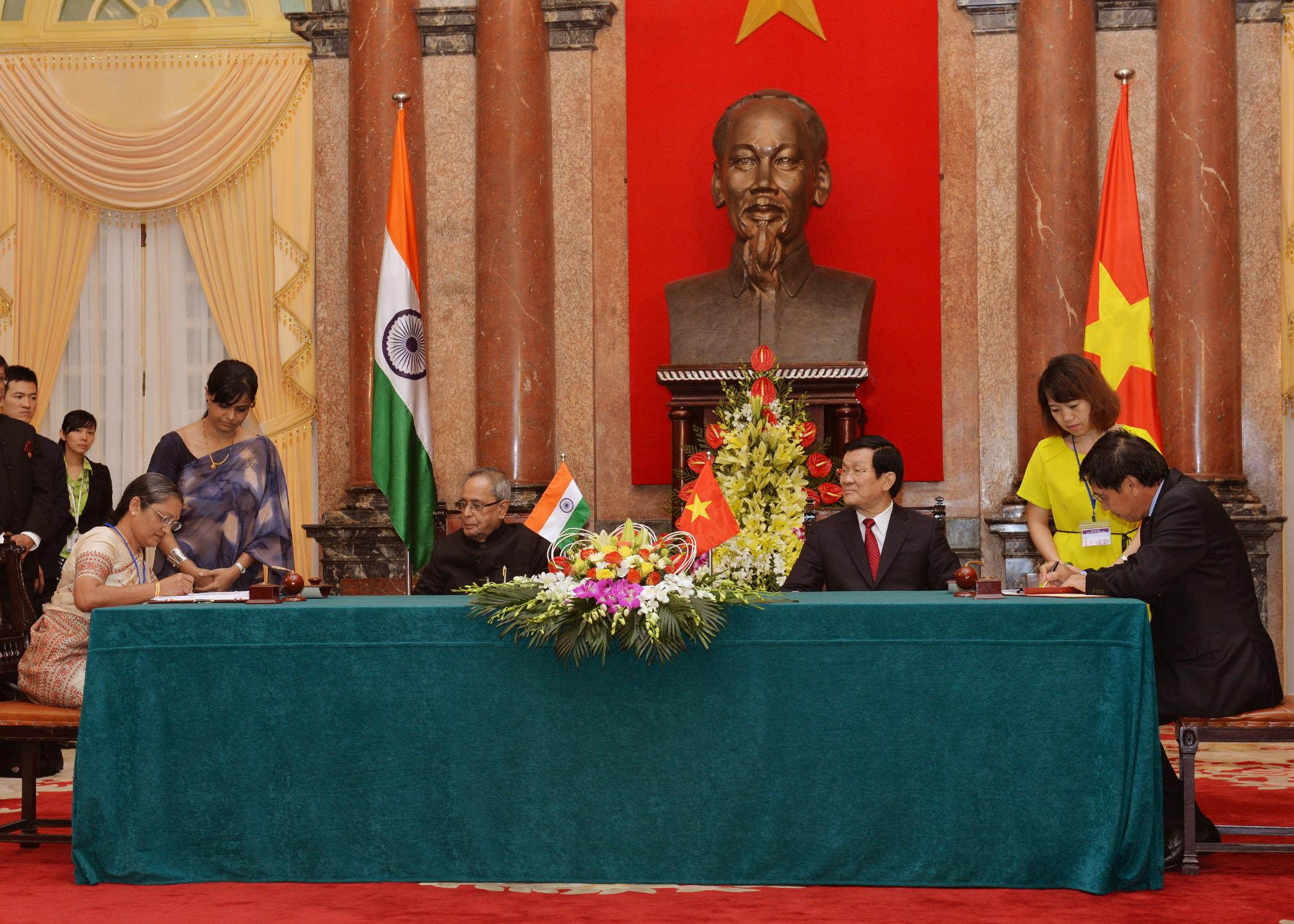 The President of India, Shri Pranab Mukherjee and the President Socialist Republic of Vietnam, H.E. Mr. Truong Tan Sang witnessing the signing of the Agreements and MOU between India and Vietnam during the State Visit of President of India to Vietnam at H 