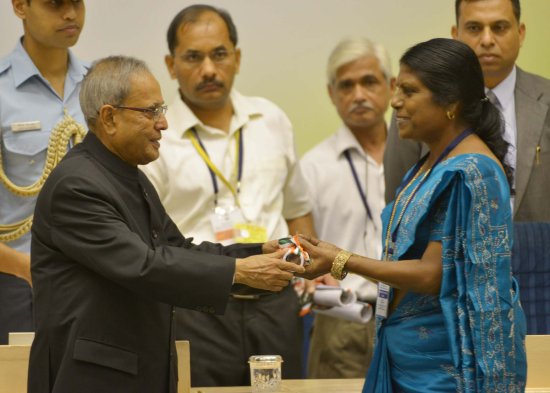 The President of India, Shri Pranab Mukherjee while presenting a National Award for the year 2012 on the occasion of Teachers’ Day at Vigyan Bhavan in New Delhi on September 5, 2013.