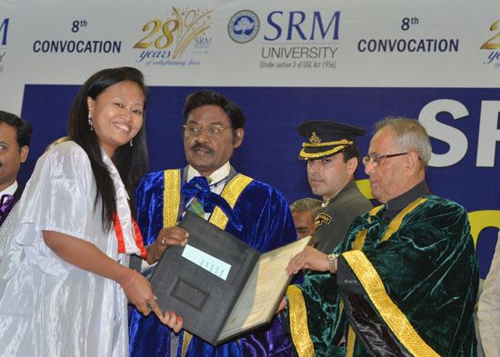The President of India, Shri Pranab Mukherjee presenting a PhD degree to a student at the Convocation of SRM Univeristy at Chennai, Tamil Nadu on December 28, 2012. Also seen is the Chancellor of the SRM University, Dr T.R. Pachamuthu.